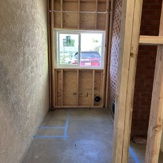 Framing a new window opening during an entry-to-office conversion in Lakeside