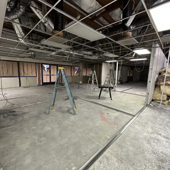 Metal stud framing and ceiling grid going in during the Miramar gym tenant improvement